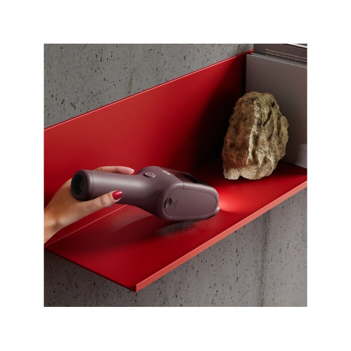 Product vacuuming fine dust on a shelf
